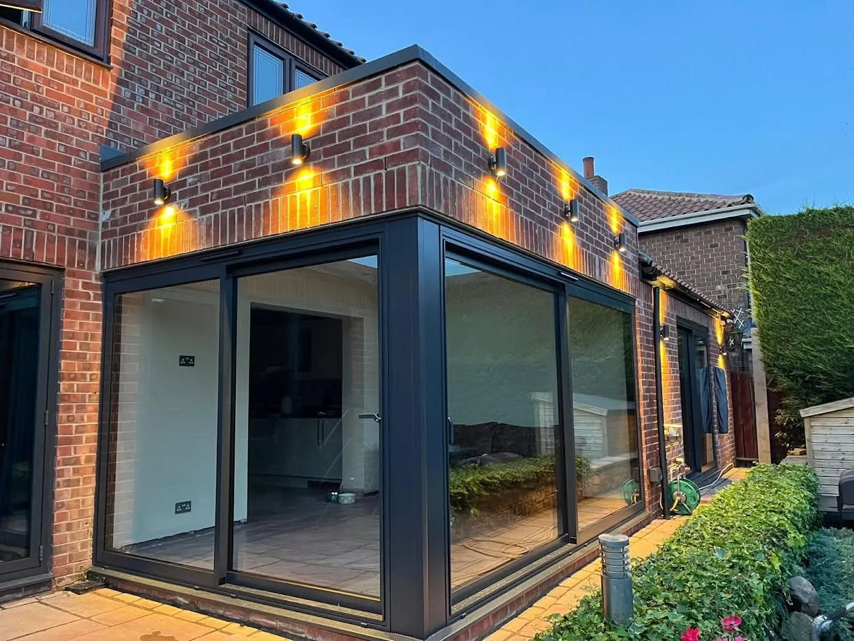 Brick rear extension with corner sliding glazing in Penarth — All Aspects Construction