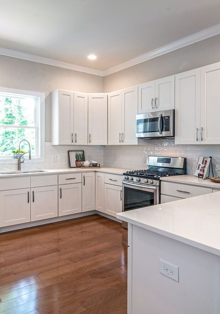 Modern white fitted kitchen — All Aspects Construction, Cardiff