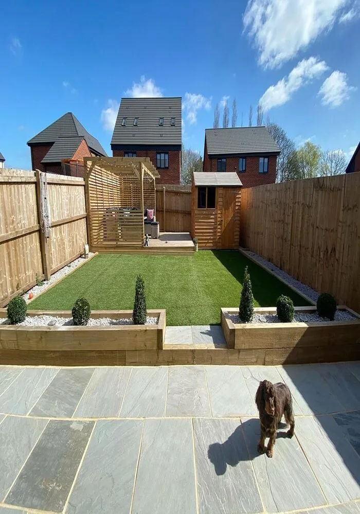 Landscaped rear garden with lawn — All Aspects Construction, Cardiff