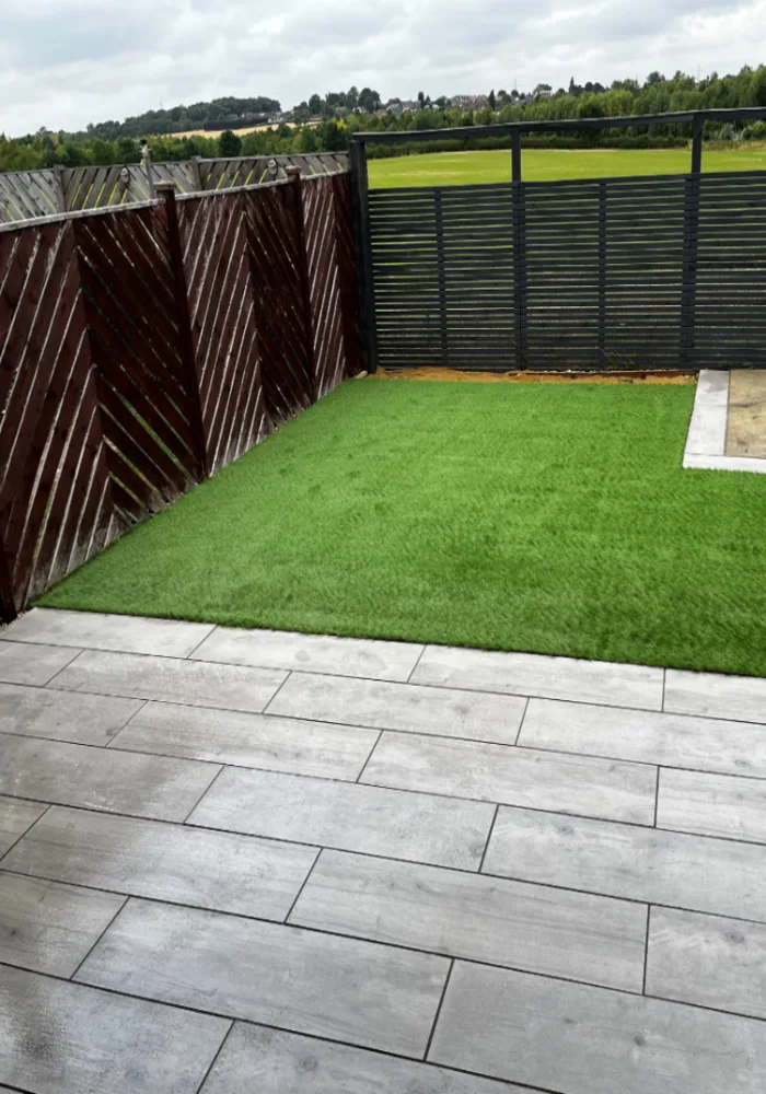Artificial lawn with paved patio and fencing — All Aspects Construction, Cardiff