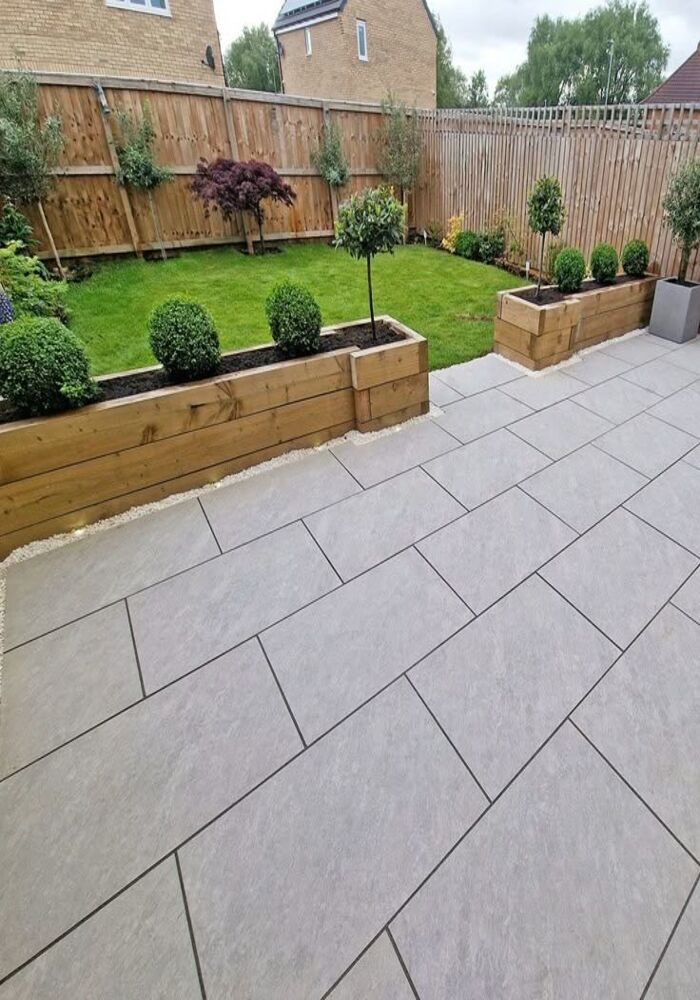 Landscaped garden with raised beds and paving — All Aspects Construction, Cardiff