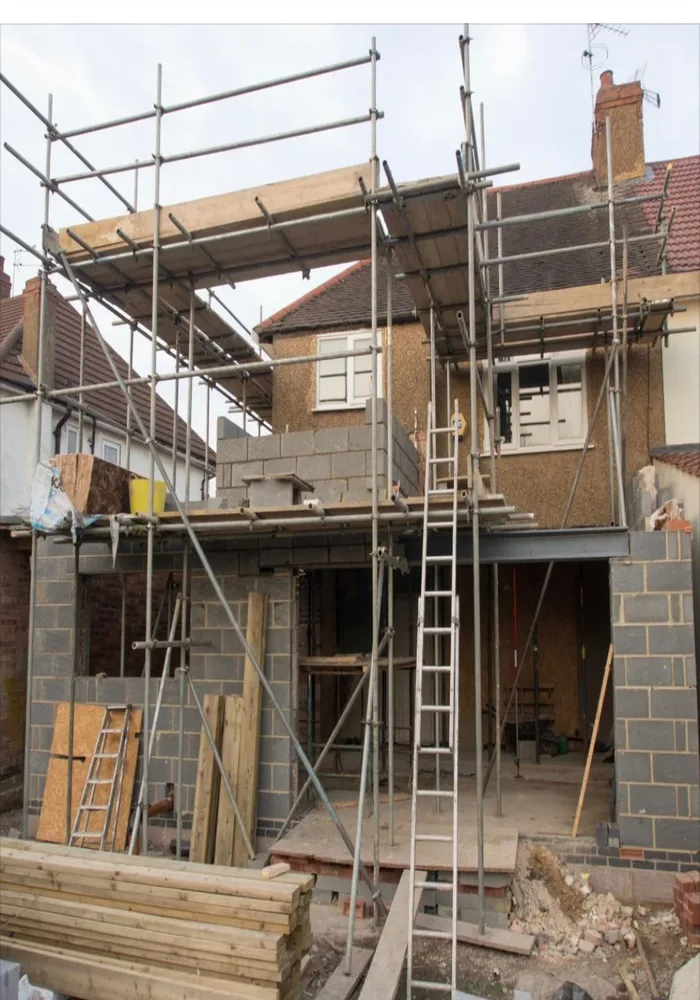 House extension under construction with scaffolding — All Aspects Construction, Cardiff